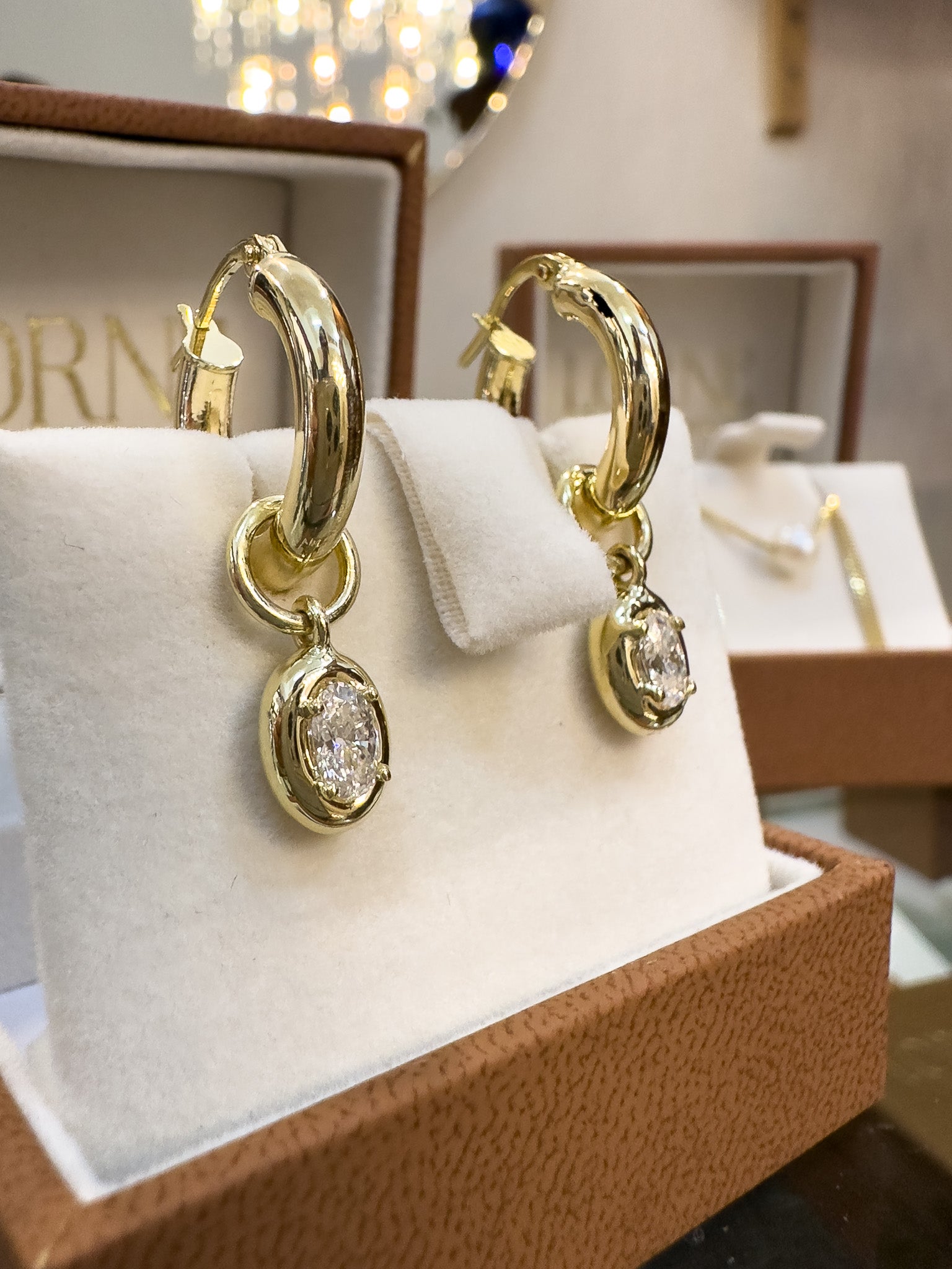 Gold earrings in jewellery box