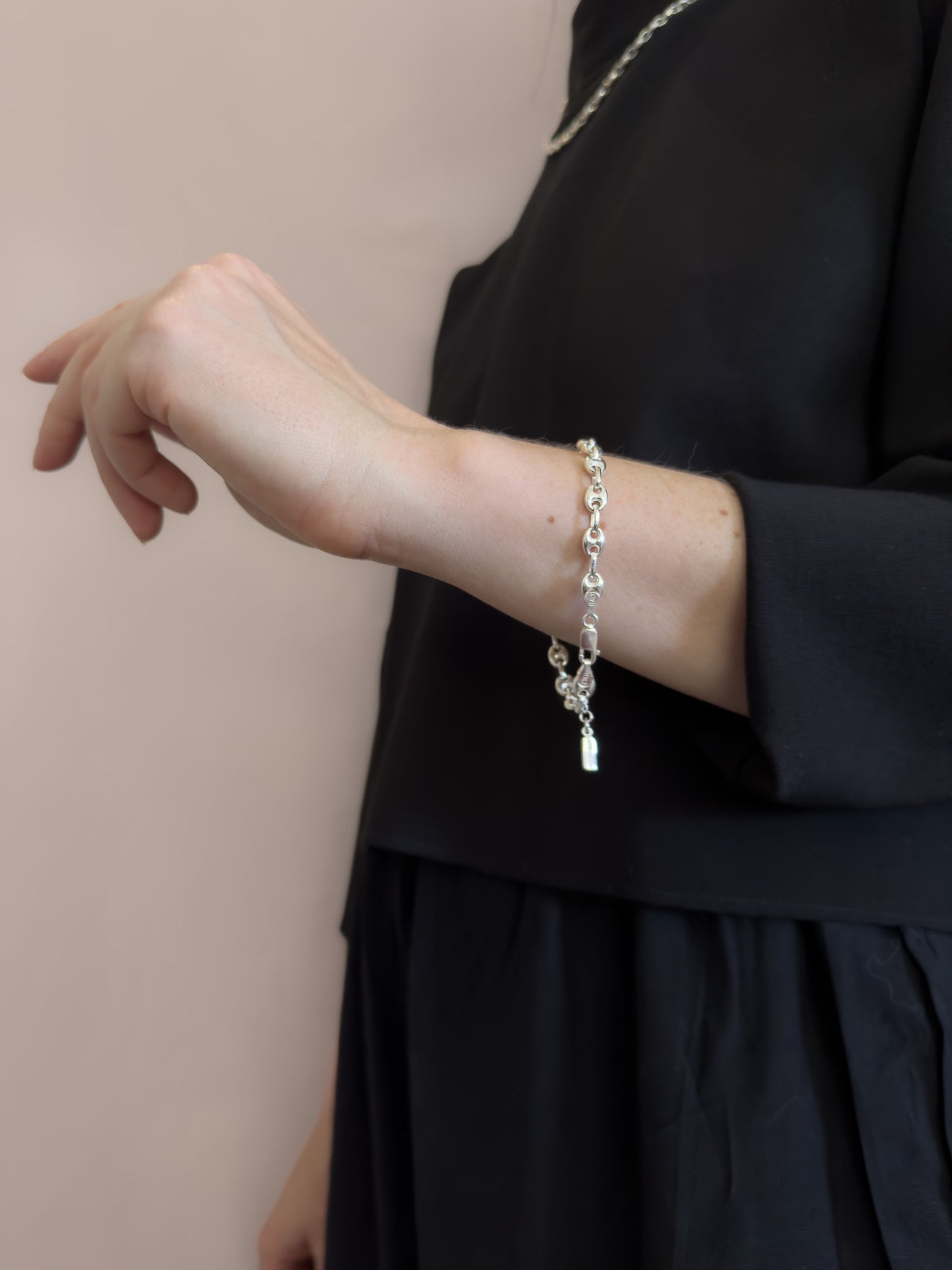 Gucci chain bracelet. A thick stylish bracelet.Model wears Gucci bracelet and Gucci link necklace