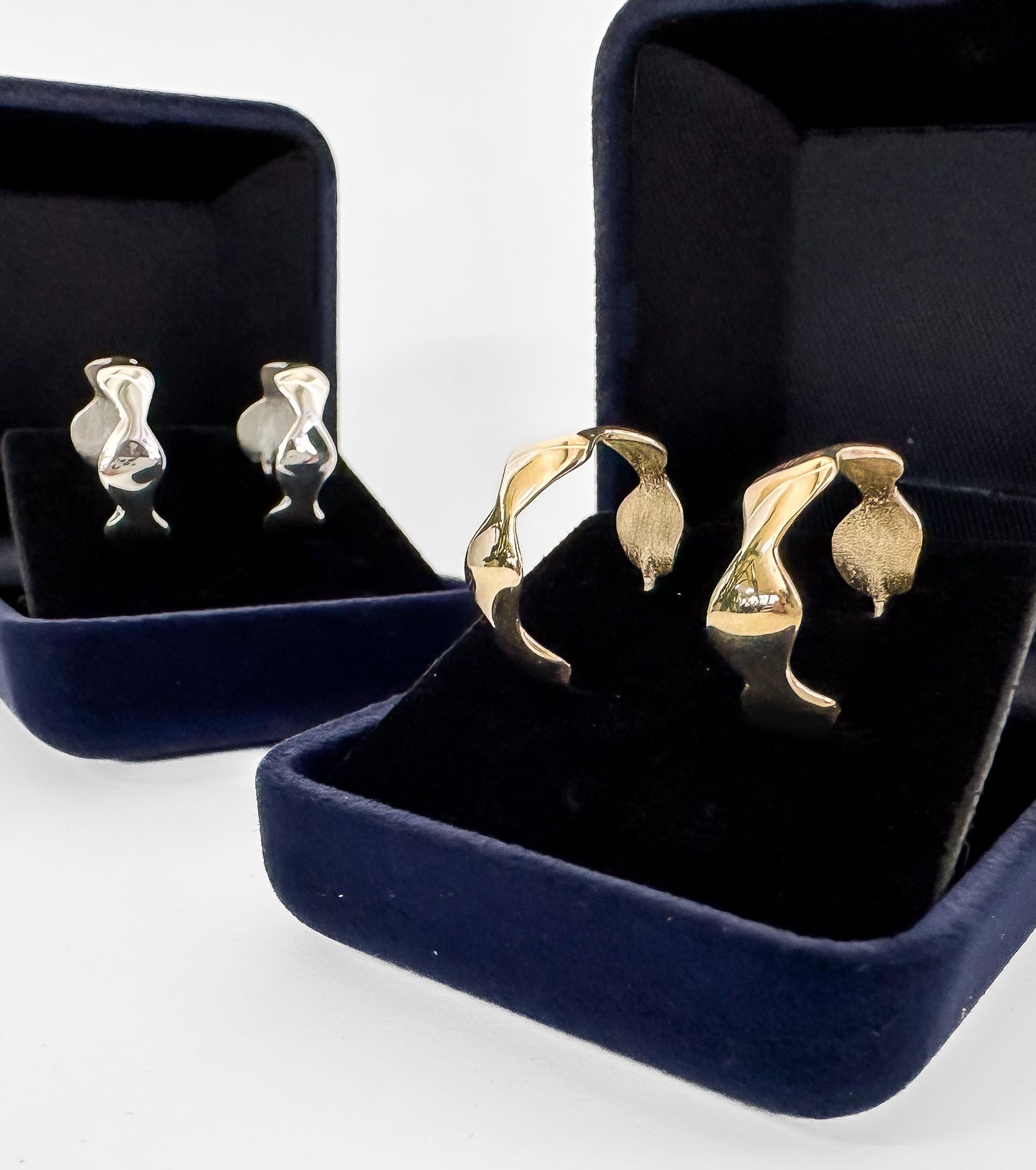ripple hoops. hoops with detail. solid gold hoops.We've considered the weight and size of these solid gold hoops to ensure your comfort throughout the day. Wear them with ease, knowing they're designed for extended wearability. Unique and Edgy: These gold hoops offer a fresh take on the classic hoop earring, setting you apart with their distinctive design. Metal: Crafted from solid 9ct yellow gold, they not only radiate timeless elegance but also stand the test of time.