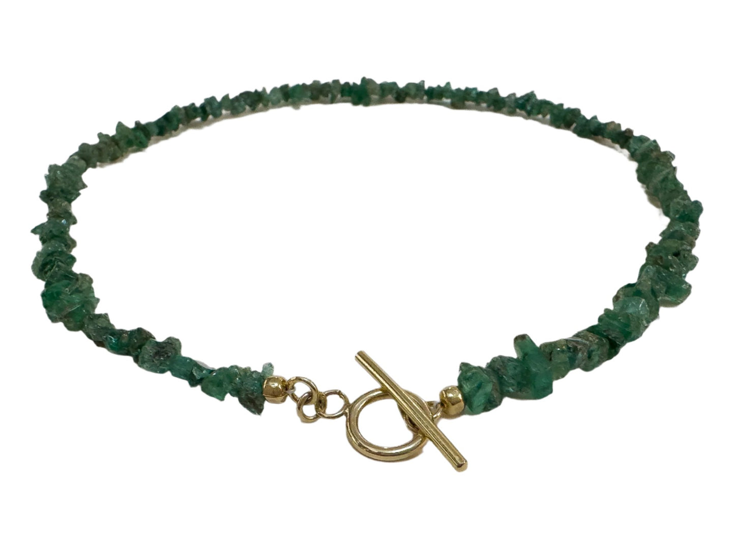 Discover the essence of summer with our 40cm Emerald Necklace—a stunning piece of jewellery that epitomizes style. Crafted with natural emerald chips and secured by a handcrafted toggle clasp, this necklace adds a touch of elegance to your summer jewellery collection. Explore the beauty of Cape Town through this exquisite piece at Lorne Jewellery.