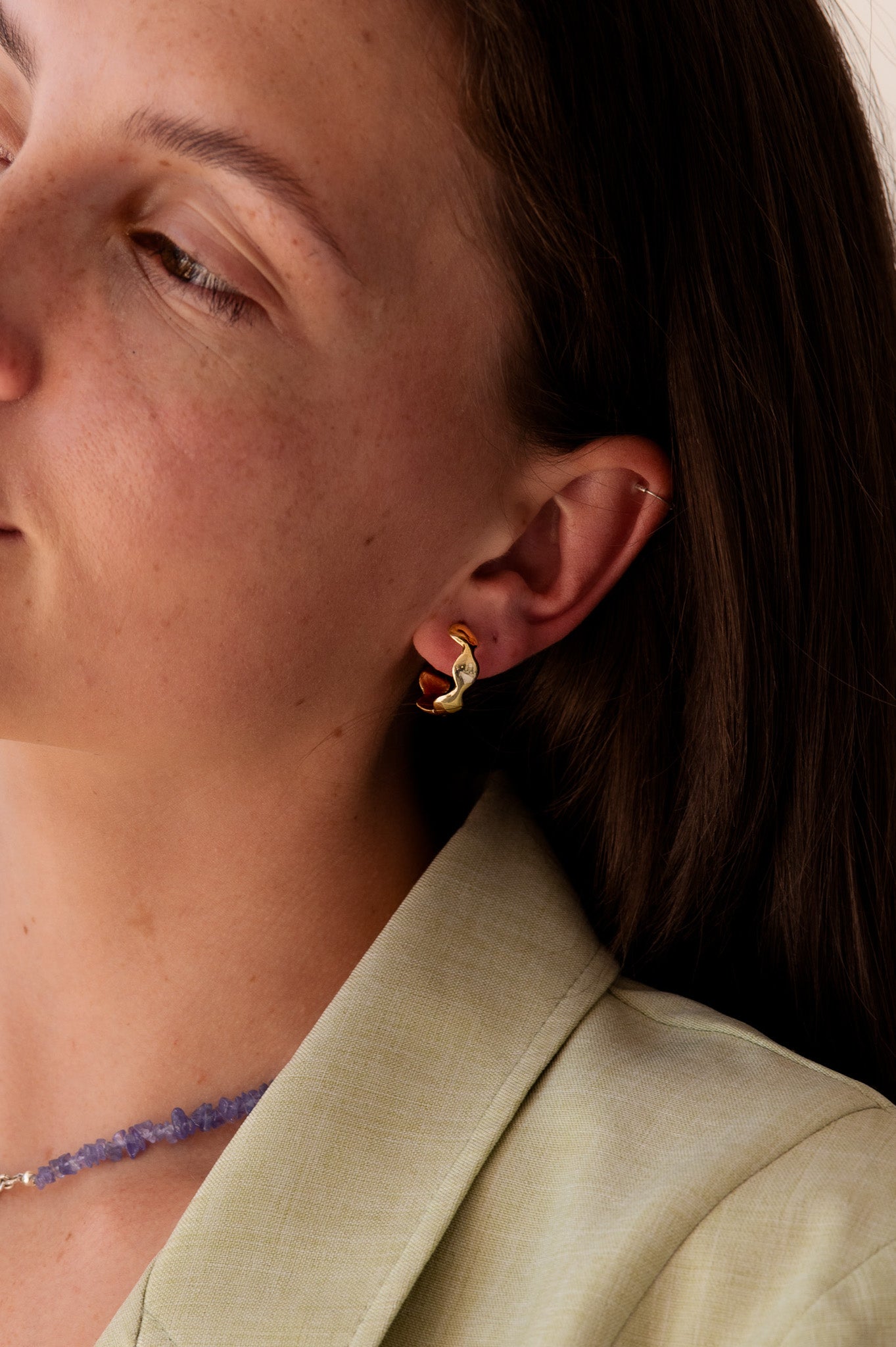 We've considered the weight and size of these solid gold hoops to ensure your comfort throughout the day. Wear them with ease, knowing they're designed for extended wearability. Unique and Edgy: These gold hoops offer a fresh take on the classic hoop earring, setting you apart with their distinctive design. Metal: Crafted from solid 9ct yellow gold, they not only radiate timeless elegance but also stand the test of time.