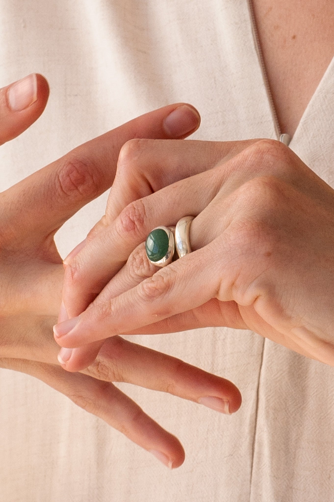 Gemstone ring in silver paired with half round silver ring.