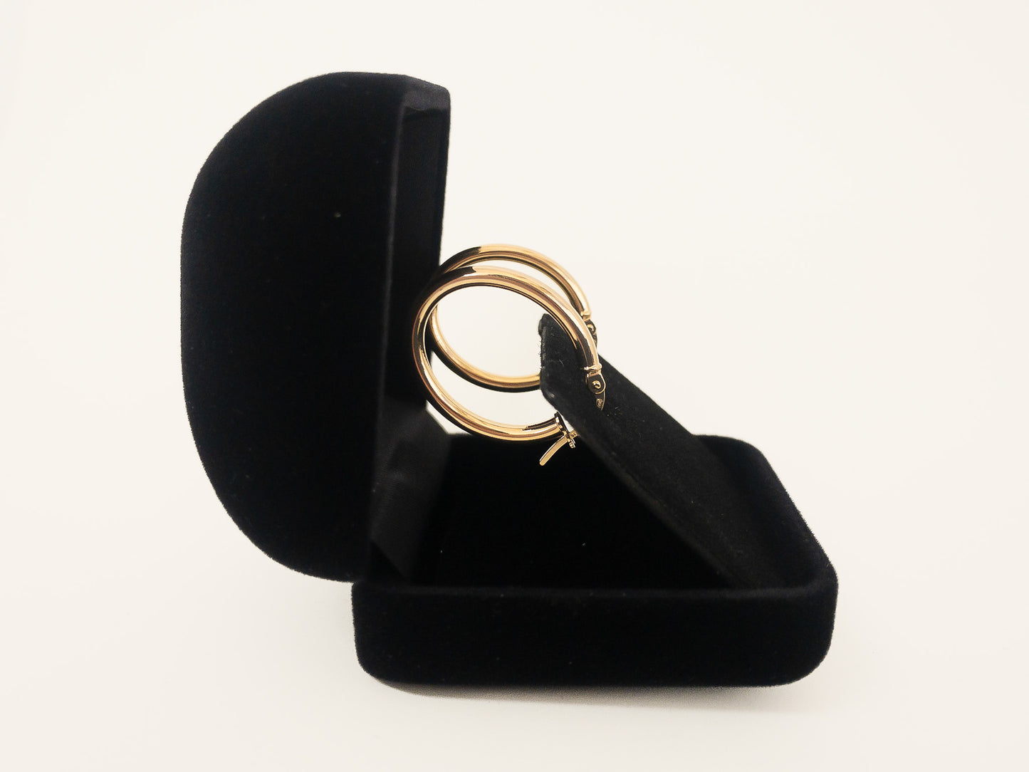 gold tube hoop earrings  in velvet jewellery box