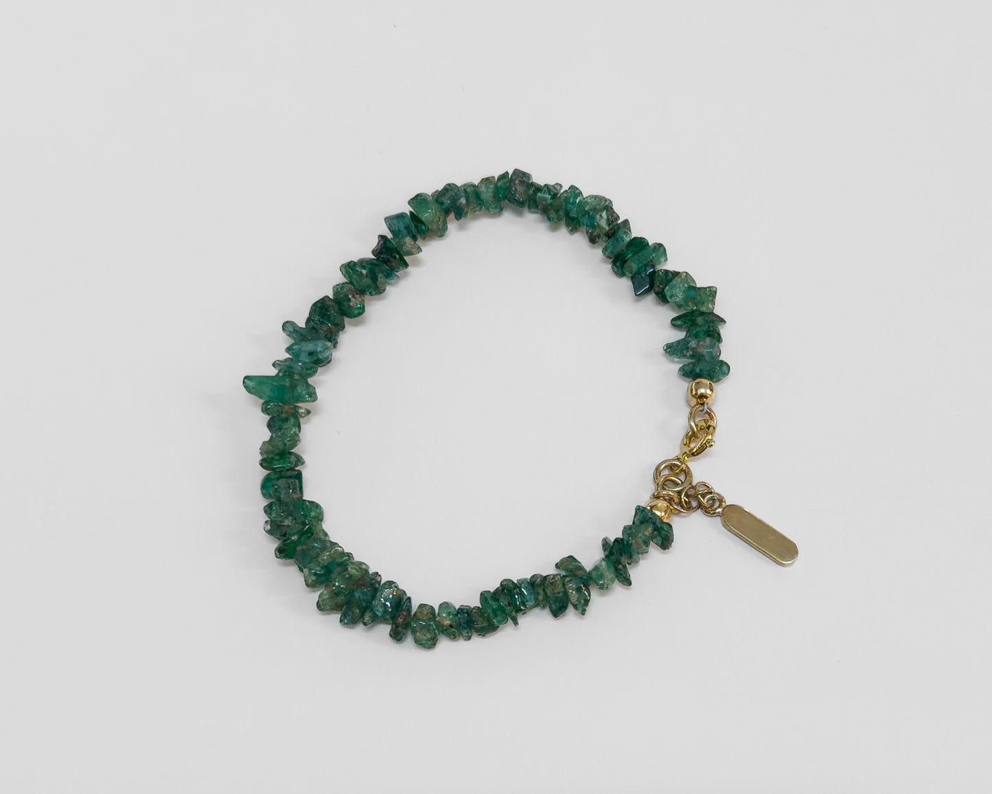 Discover the essence of summer with our 40cm Emerald Bracelet—a stunning piece of jewellery that epitomizes style. Crafted with natural emerald chips and secured by a handcrafted toggle clasp, this bracelet adds a touch of elegance to your summer jewellery collection. Explore the beauty of Cape Town through this exquisite piece at Lorne Jewellery.