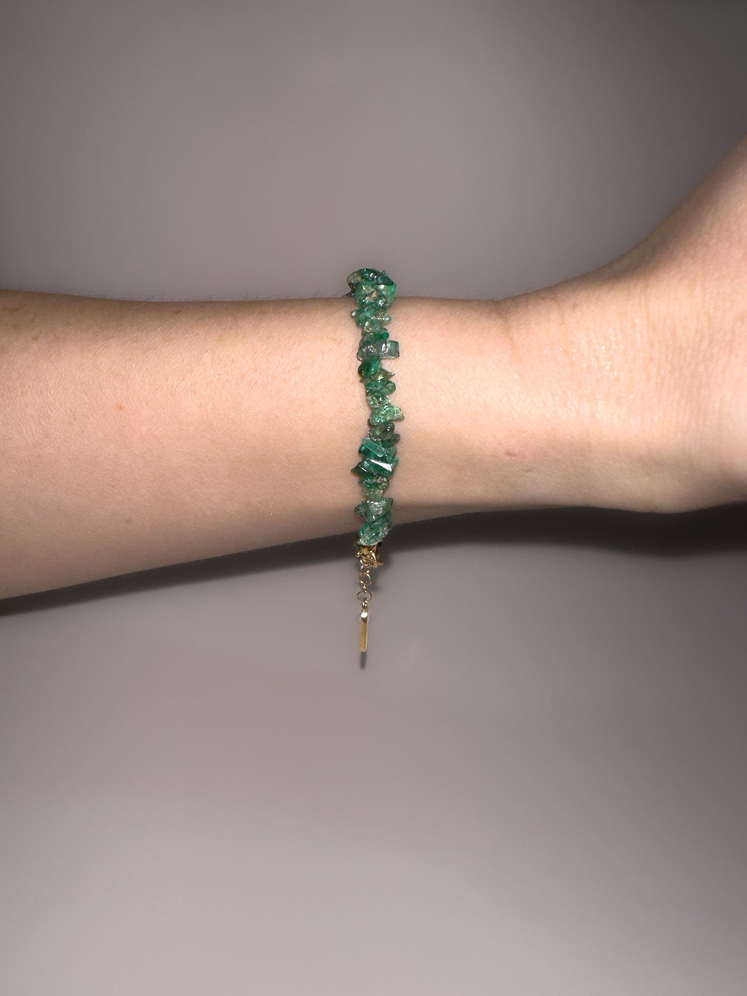 Discover the essence of summer with our 40cm Emerald Bracelet—a stunning piece of jewellery that epitomizes style. Crafted with natural emerald chips and secured by a handcrafted toggle clasp, this bracelet adds a touch of elegance to your summer jewellery collection. Explore the beauty of Cape Town through this exquisite piece at Lorne Jewellery.