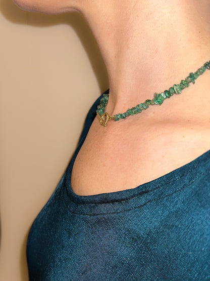 Discover the essence of summer with our 40cm Emerald Necklace—a stunning piece of jewellery that epitomizes style. Crafted with natural emerald chips and secured by a handcrafted toggle clasp, this necklace adds a touch of elegance to your summer jewellery collection. Explore the beauty of Cape Town through this exquisite piece at Lorne Jewellery.