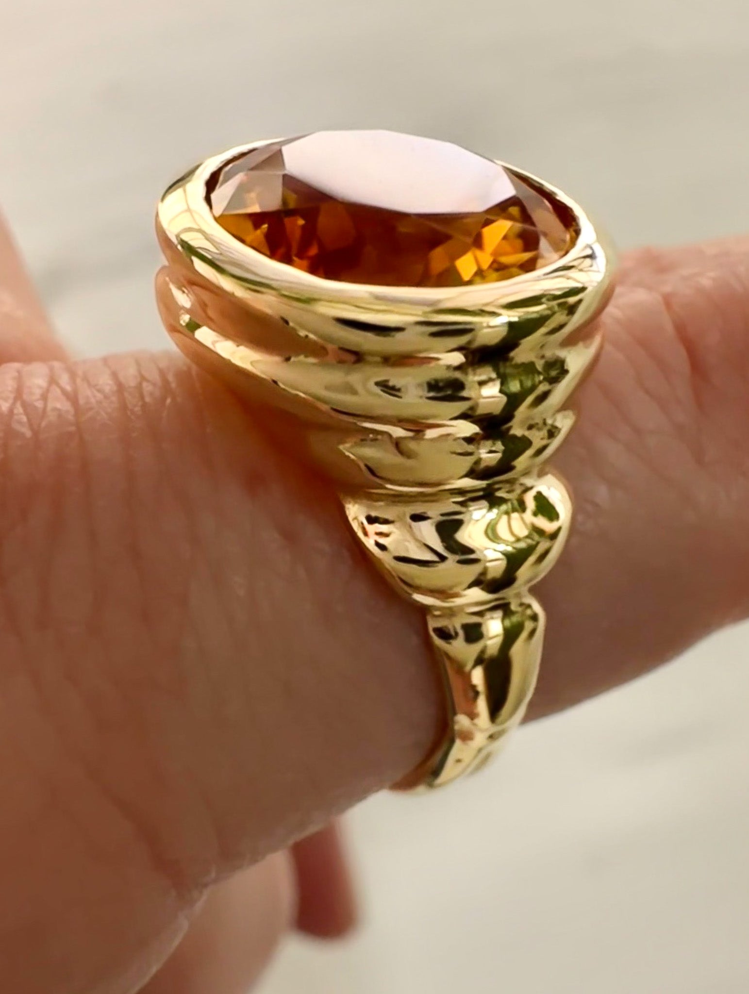 Gold ring deals with citrine stone