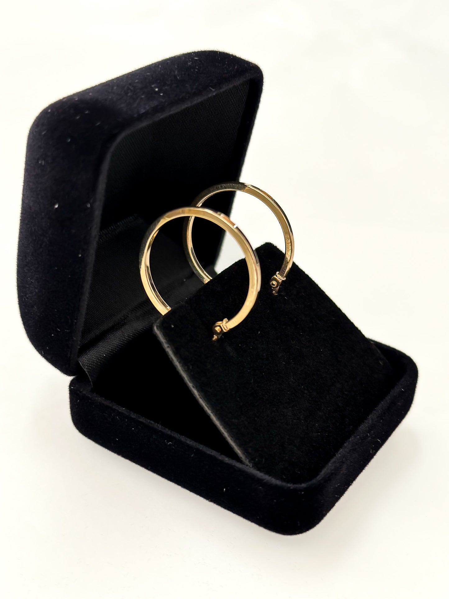LORNE 9ct Yellow Gold 20mm Hoop Earring—a minimalist's dream of clean lines and reflective surfaces.