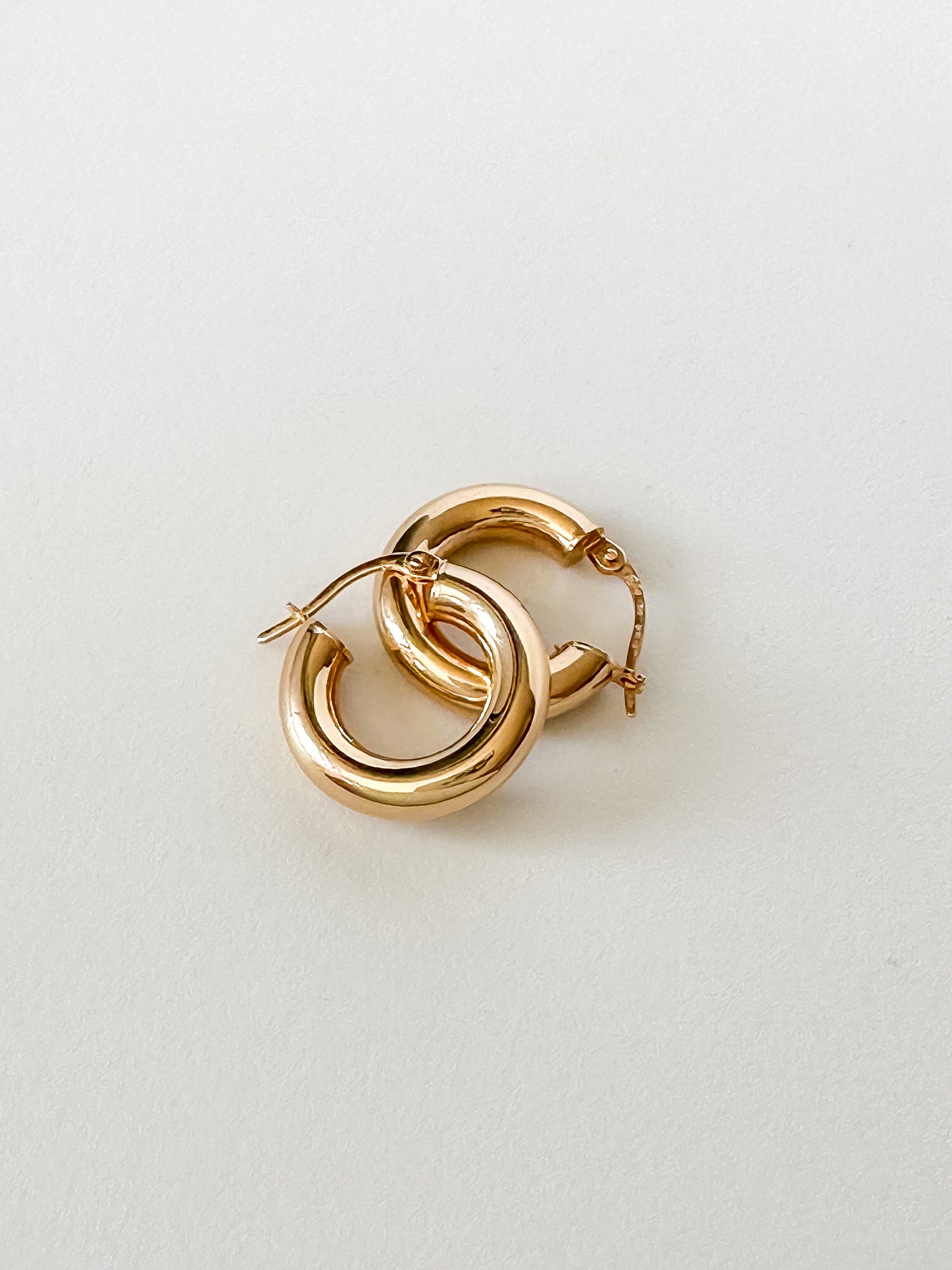 The ultimate staple in hoop earrings for your everyday wear—the LORNE Classic. solid gold.  10mm Hoop Earrings.  