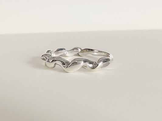 LORNE Organic Corkscrew Twist Ring—a playful and versatile addition that adds a touch of fun to your jewellery.  Key Features:  Organic Corkscrew Design: This ring boasts an organic corkscrew-style twist that adds a unique and whimsical flair to your stackable collection.