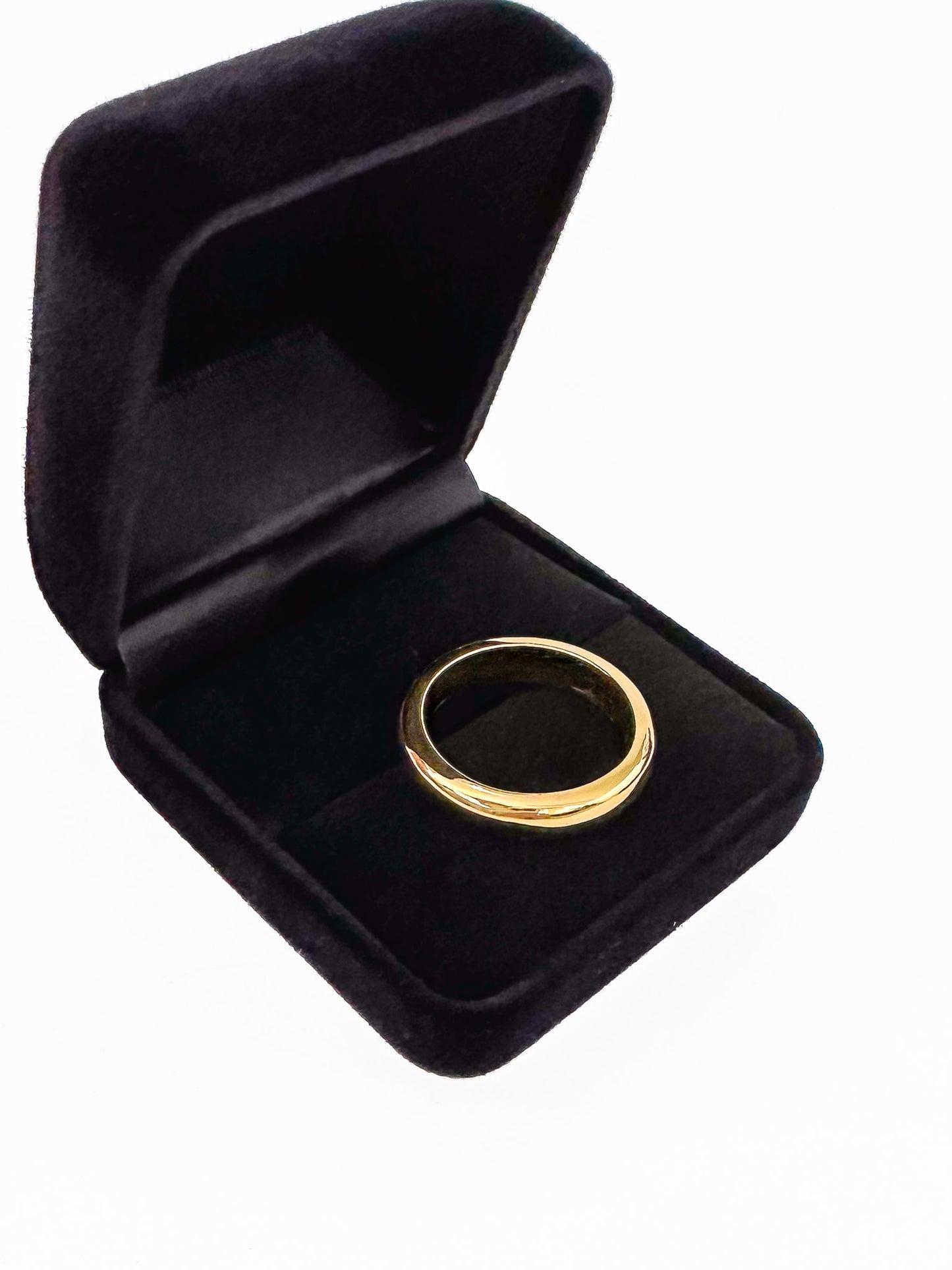 The ideal plain-band ring.  Key Features:  Versatile Design: This half round ring is a chameleon of style, ready to stand out solo or layer up. Its chunky, weighty feel adds substance to your ensemble. Width & weight: 4mm , average 7g (9ct) & 9g (18ct) Precious Metal Options: Available in solid 9ct or 18ct yellow gold, it serves as an ideal wedding band or addition to your everyday stack. 