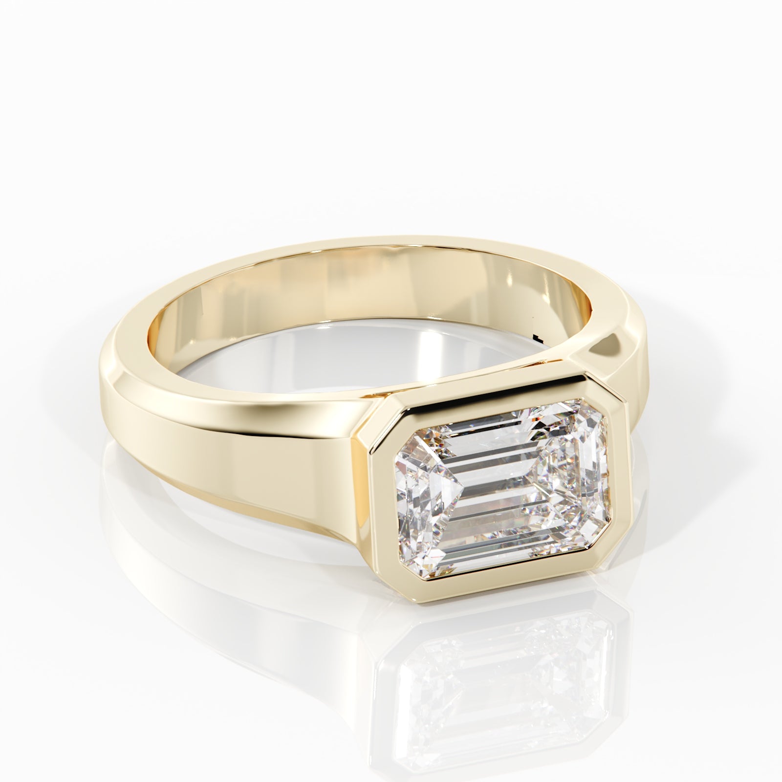 Gold ring with a diamond on a white background