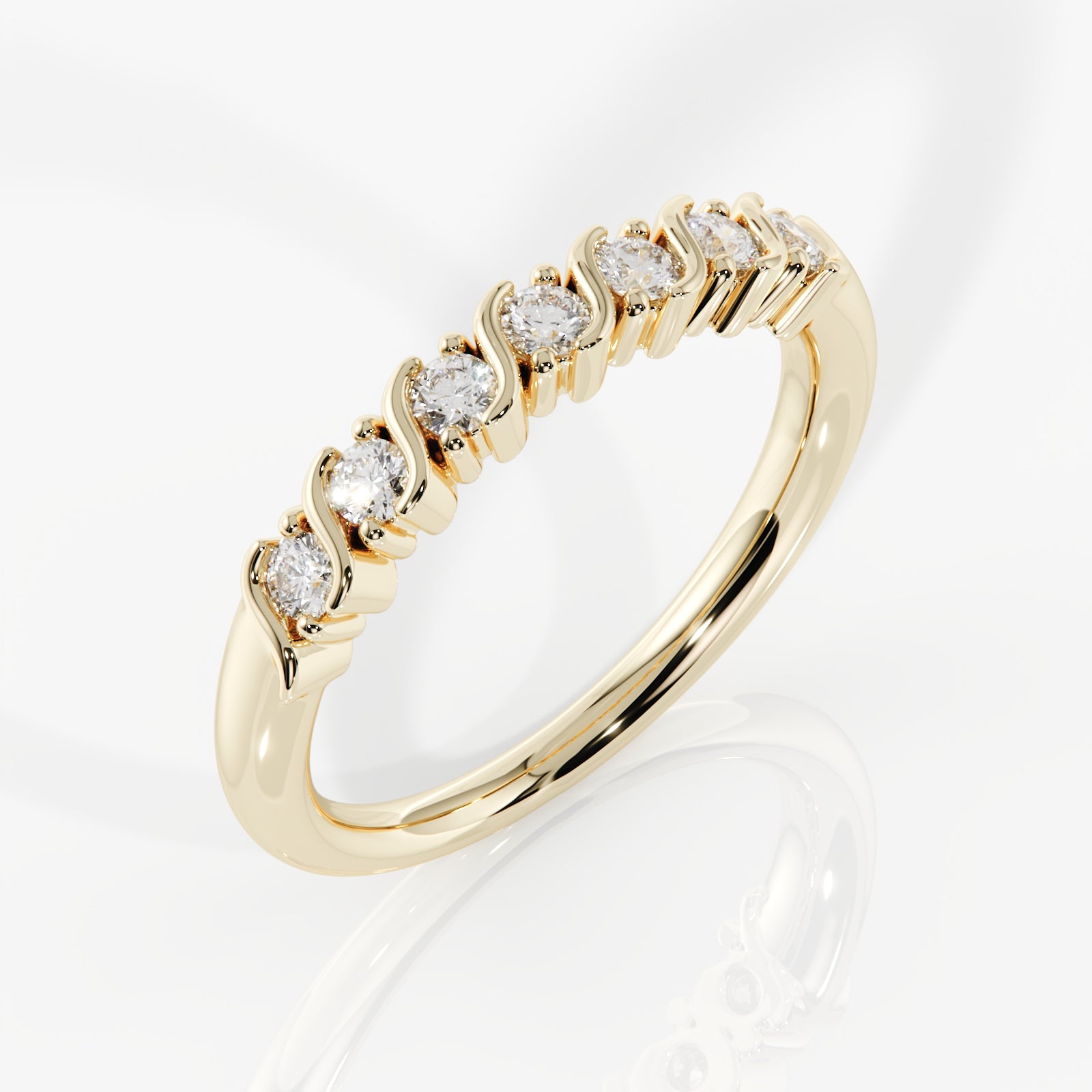 Gold ring with diamonds on a white background