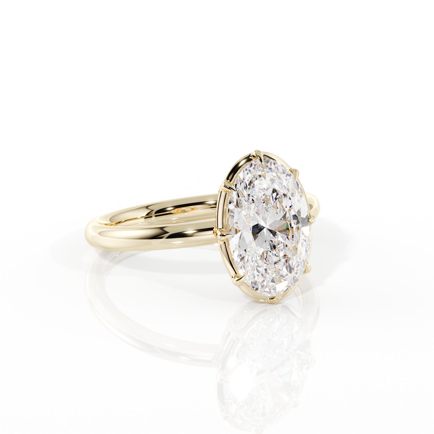 Gold ring with a large diamond on a white background