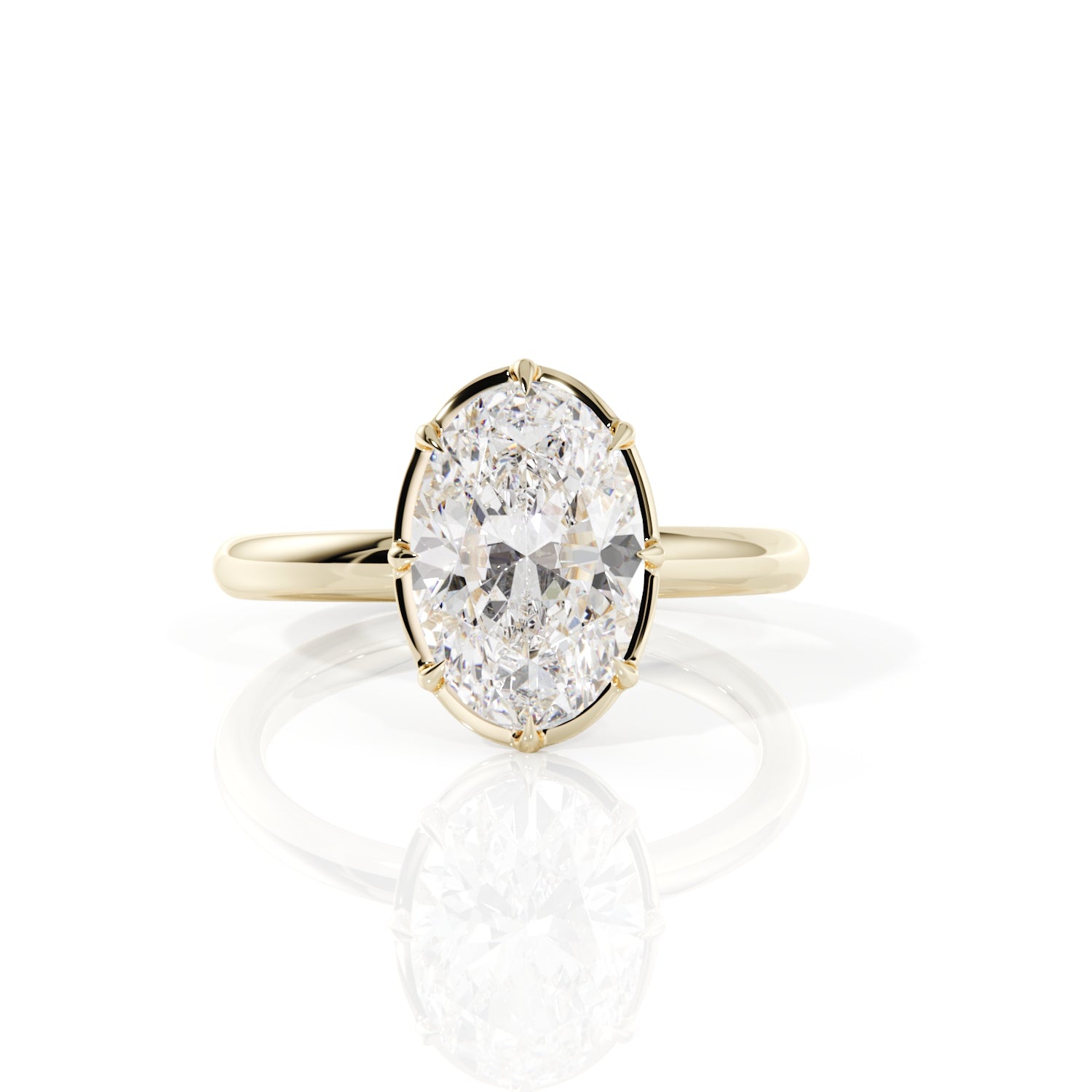 oval 8-claw solitaire engagement ring in yellow gold and large diamond.