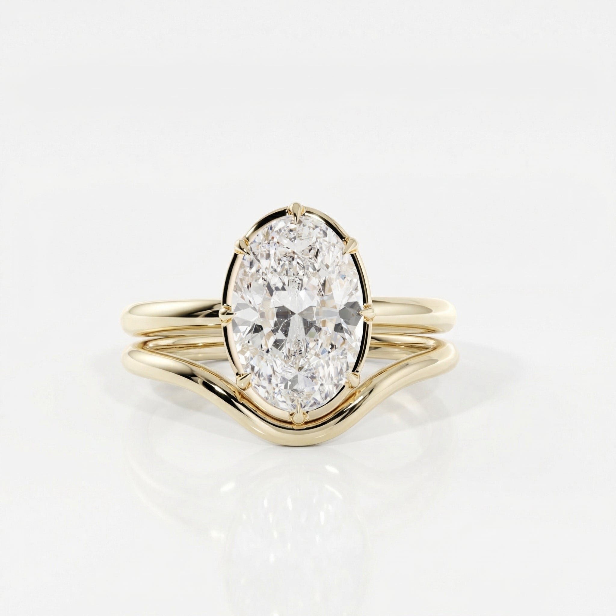 Gold ring with a large diamond on a light gray background