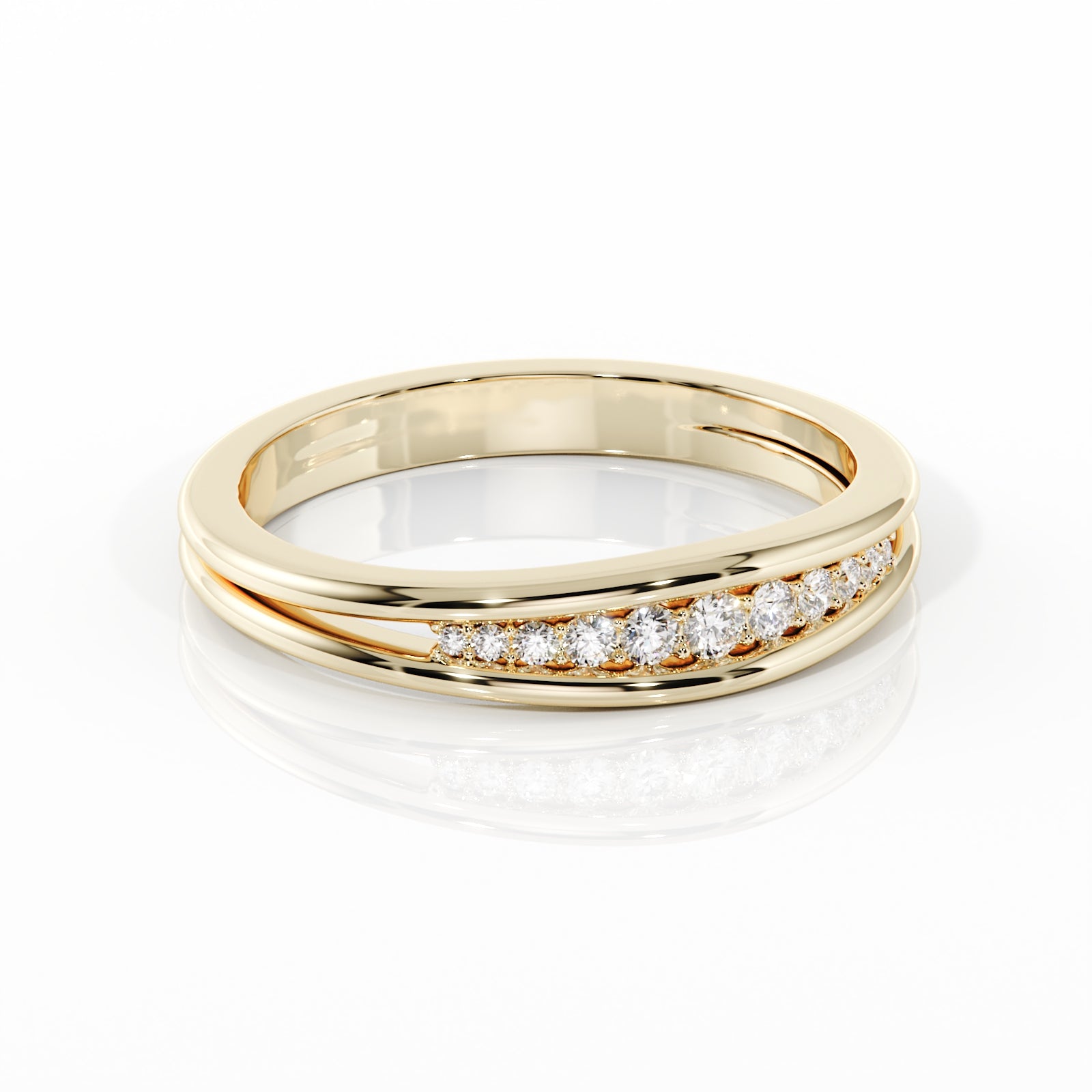 A yellow gold eternity-style ring featuring a row of round-cut clear gemstones set across the front, photographed on a clean white background with a soft reflection below.