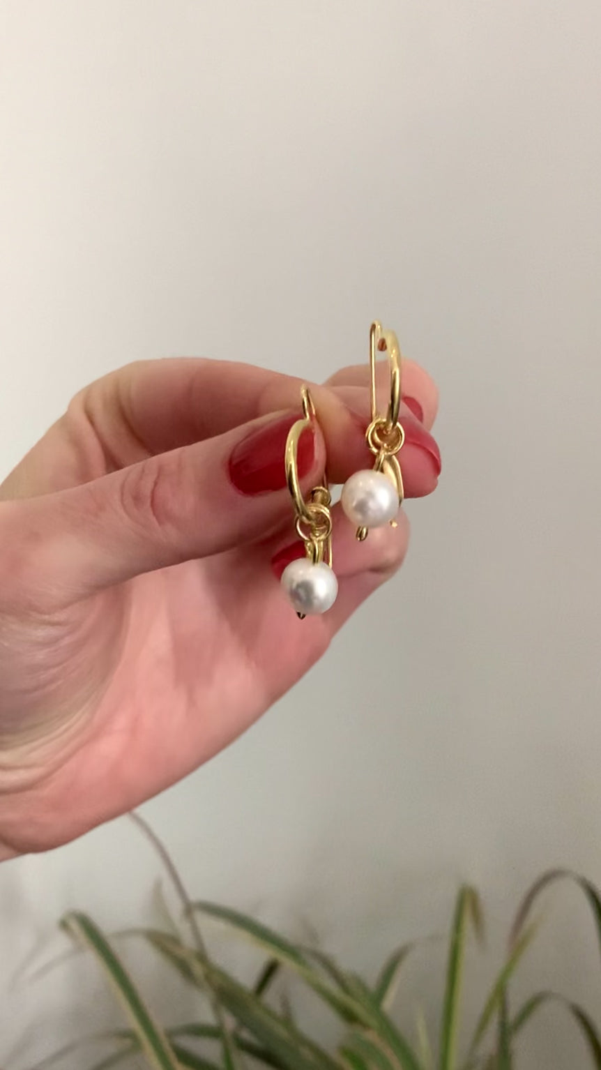  hoop earrings with charms.Sterling Silver: Crafted from high-quality 925 sterling silver. 8mm A-Grade Round Freshwater Pearl: The centre piece of these hoops, adding an element of timeless elegance.