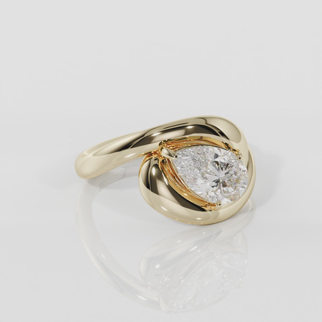 pear cut diamond crossover engagement ring 