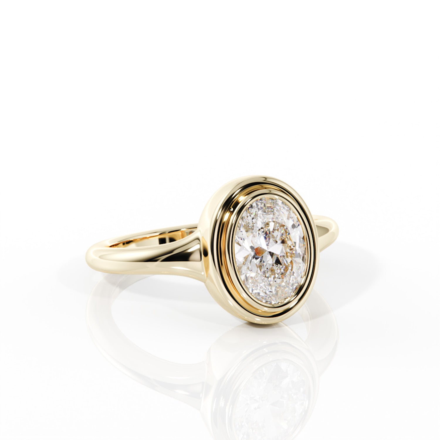 Gold ring with a diamond on a white background