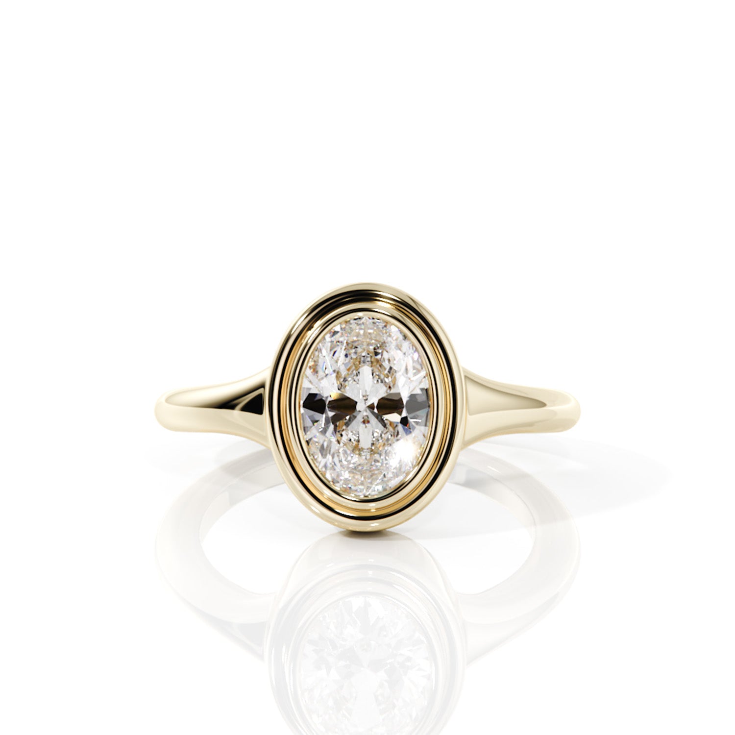 Gold ring with a diamond on a white background