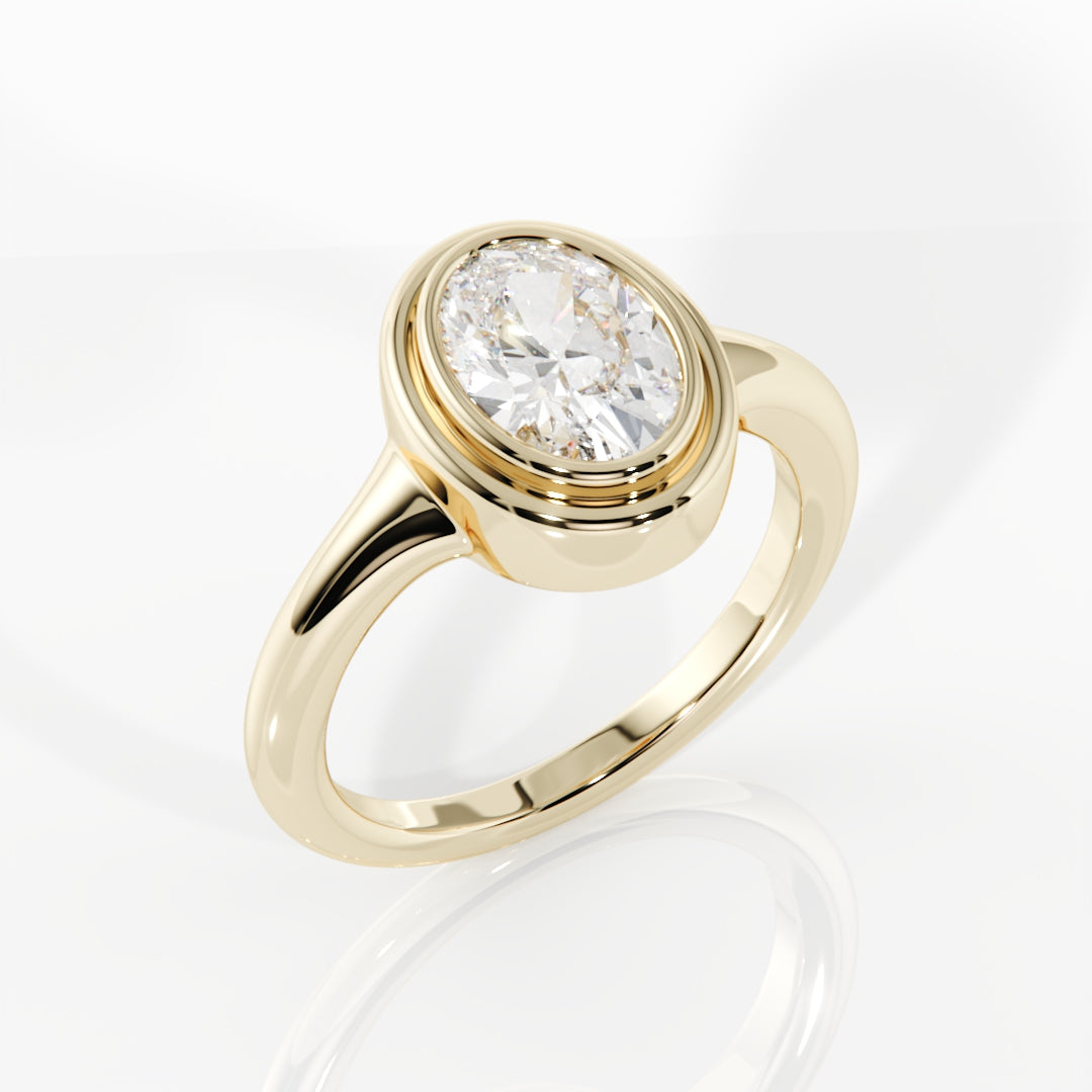 Gold ring with a large diamond on a white background