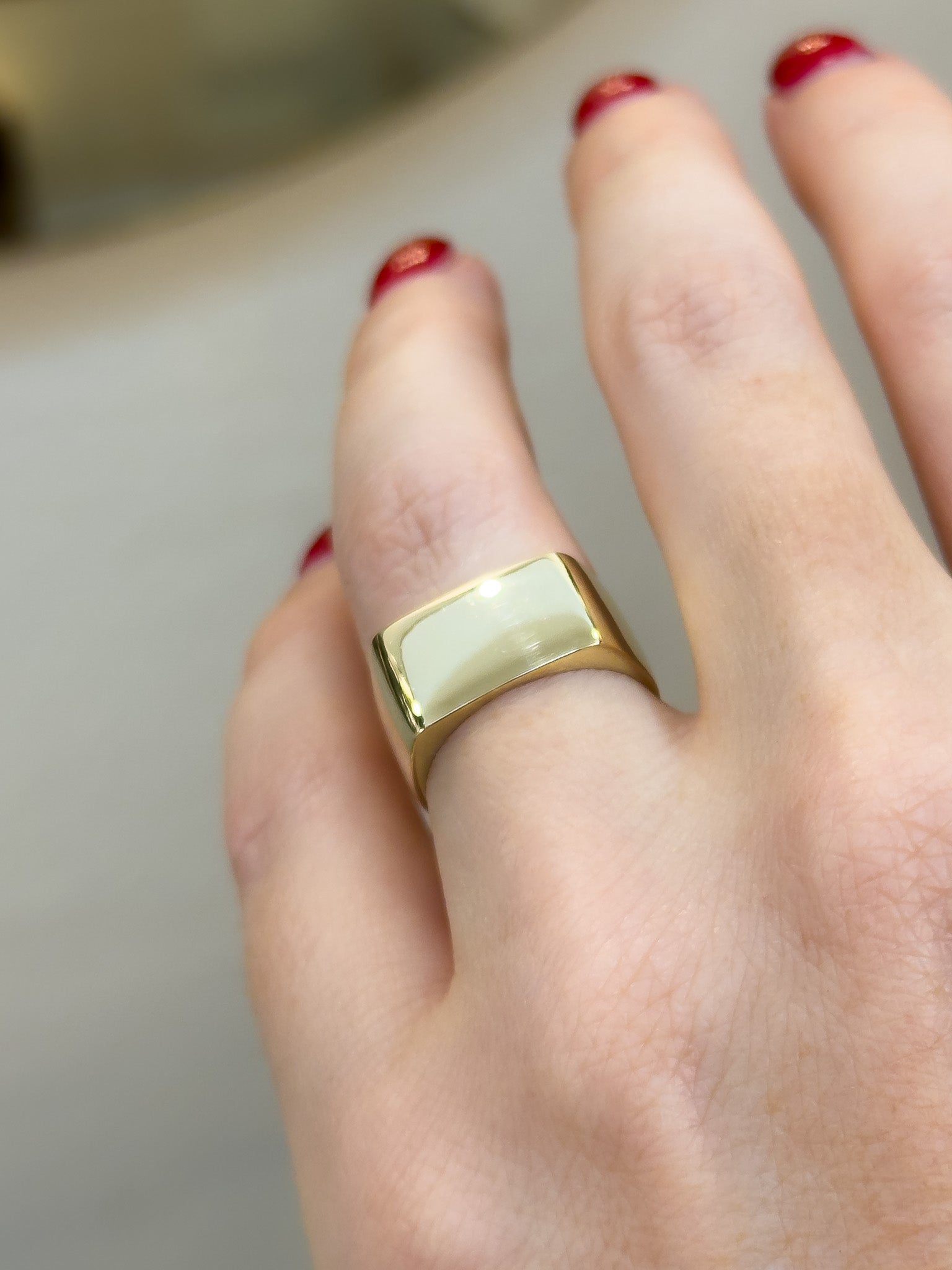wide signet style gold ring 
