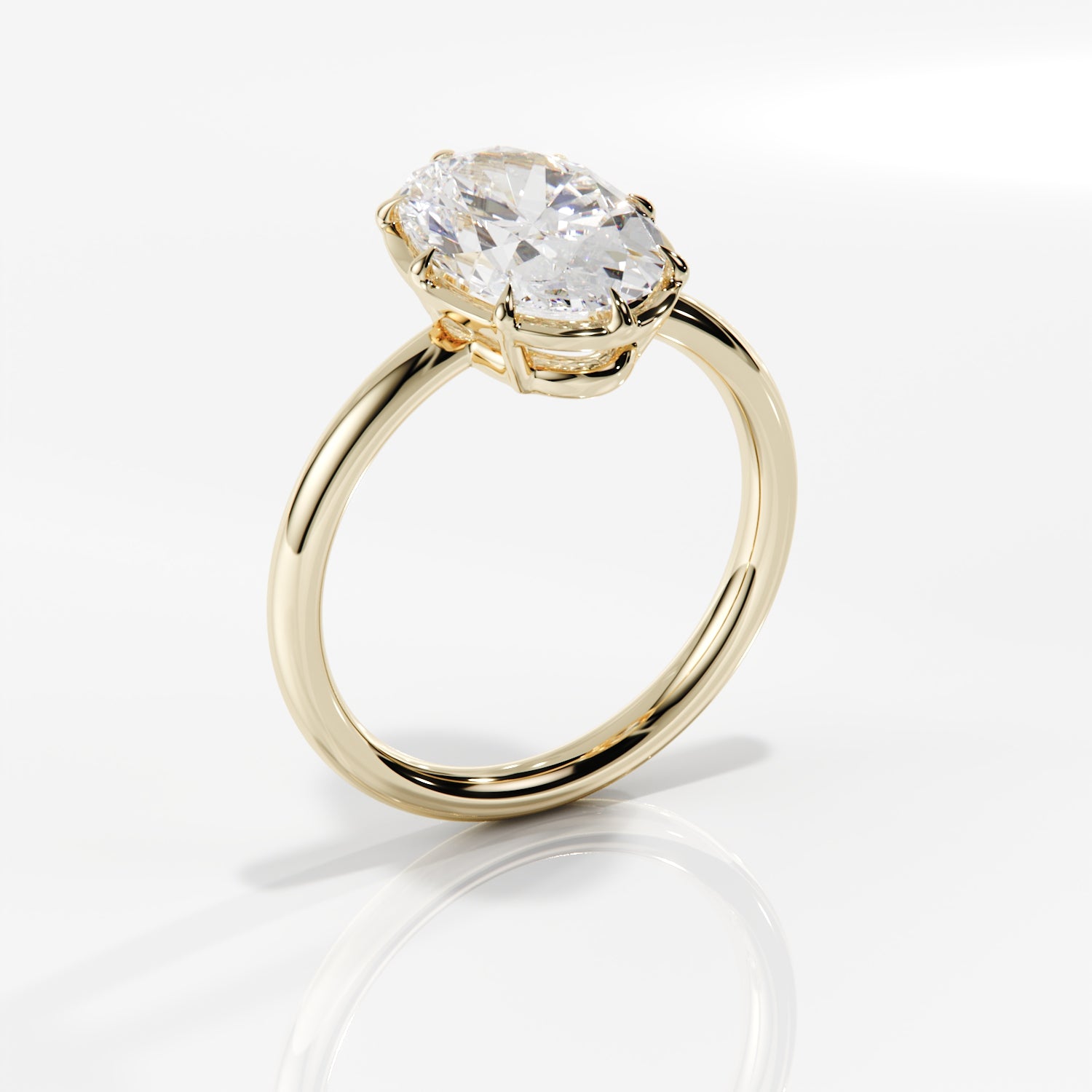 solitaire_engagement_ring_in_yellow_gold_and_large_diamond_jewellery